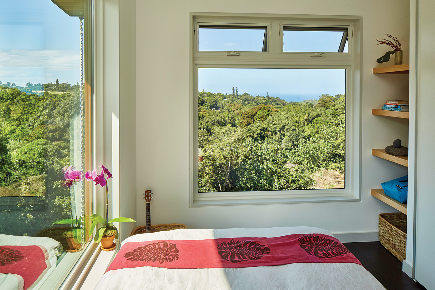 a small room with casement window overlooking a hiking trail