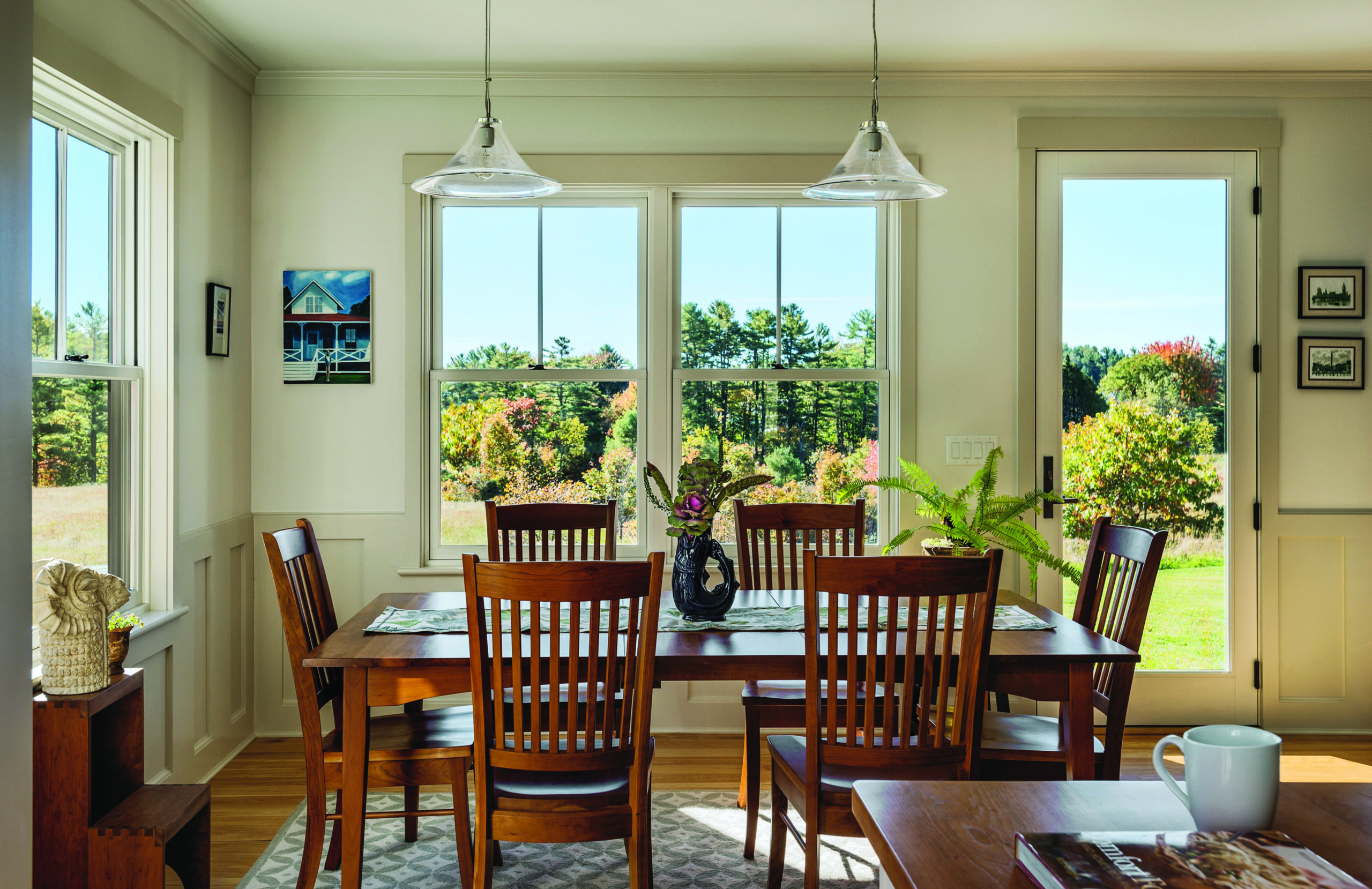 hung windows adjacent to frenchwood hinged patio door