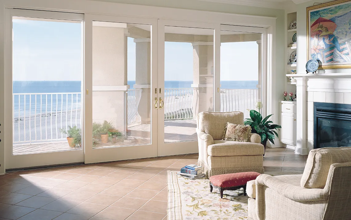 living room with glass patio double door and a fireplace with tile floor