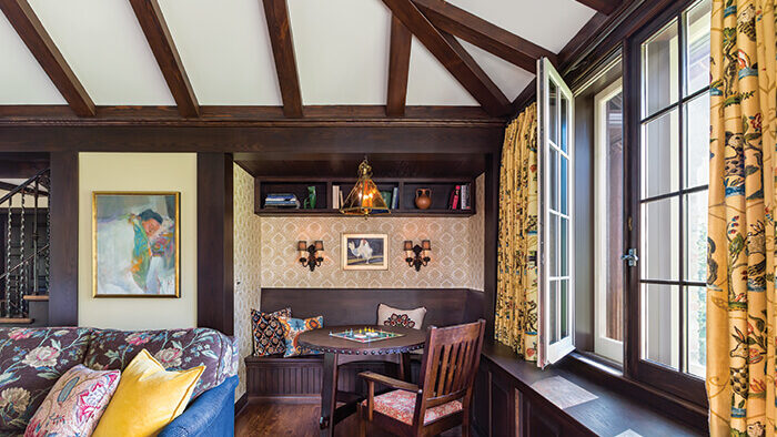 inswing casement windows with dark brown wood frame